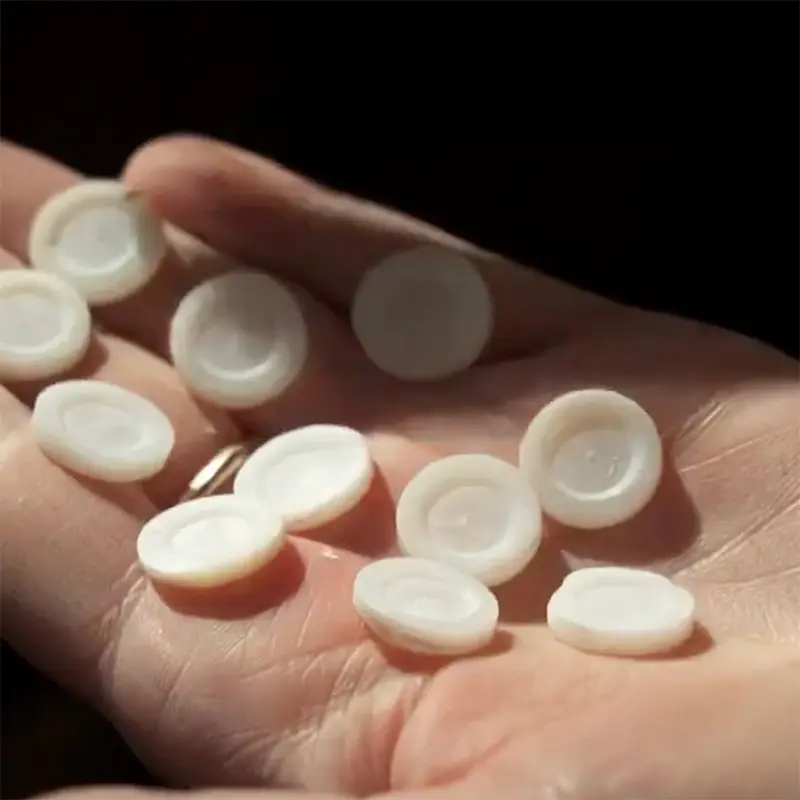 Boutons en nacre blanche - Photyne