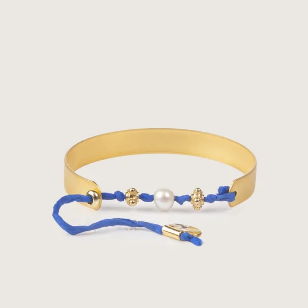 Manchette or mat et cordon bleu décoré d'une perle d'eau douce - Modèle unique Rita - Photyne.