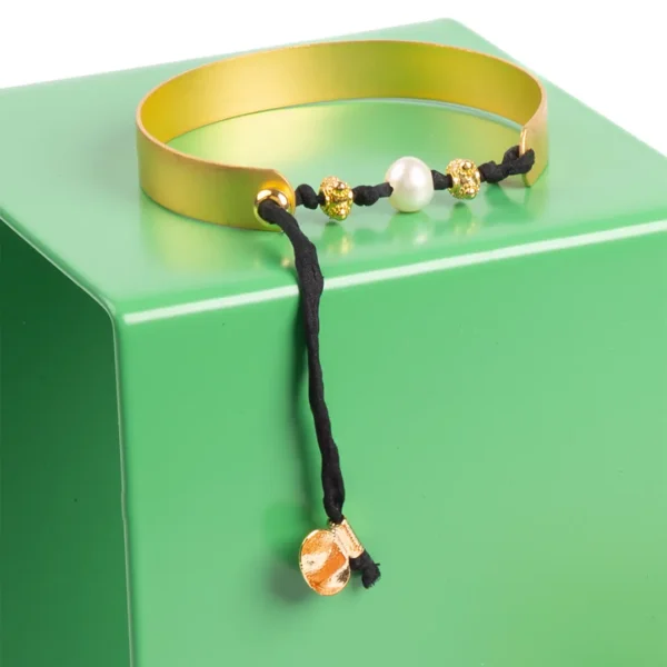 Manchette Rita fil de soir Habotai Noir et perle blanche - le savoir faire Photyne