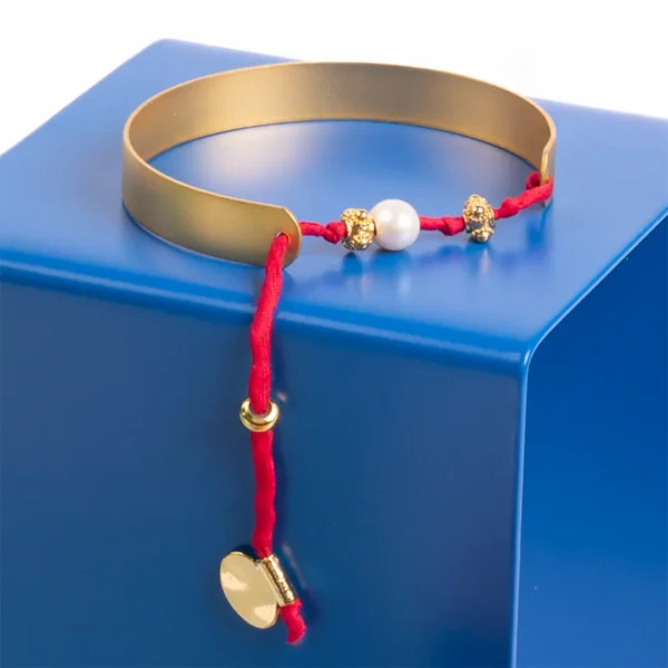 Manchette Rita - or fin et cordon rouge - un Bijou Photyne