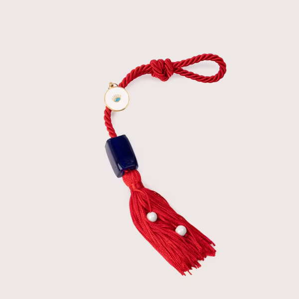 Porte-bonheur Kyvos par Photyne, perle en verre bleu et œil protecteur émaillé contre le mauvais œil, véritable talisman de protection , une création originale.