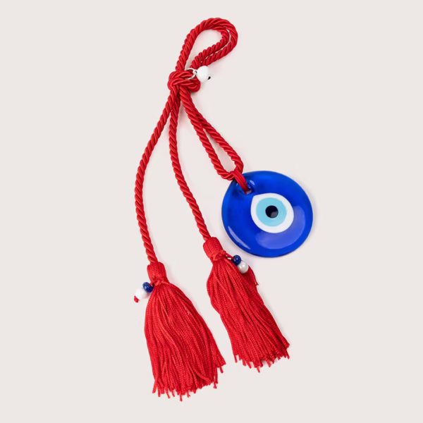 Talisman décoratif méditerranéen, œil grec bleu avec perles et grelot, symbole de protection et d’harmonie, création unique Photyne.